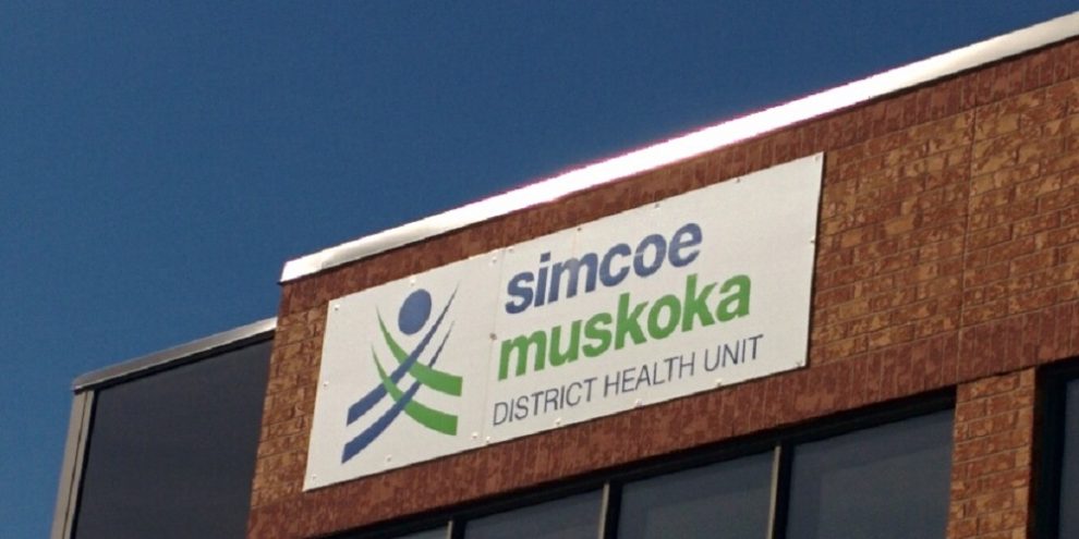 Signage outside the Simcoe Muskoka District Health Unit building in Barrie, Ontario.