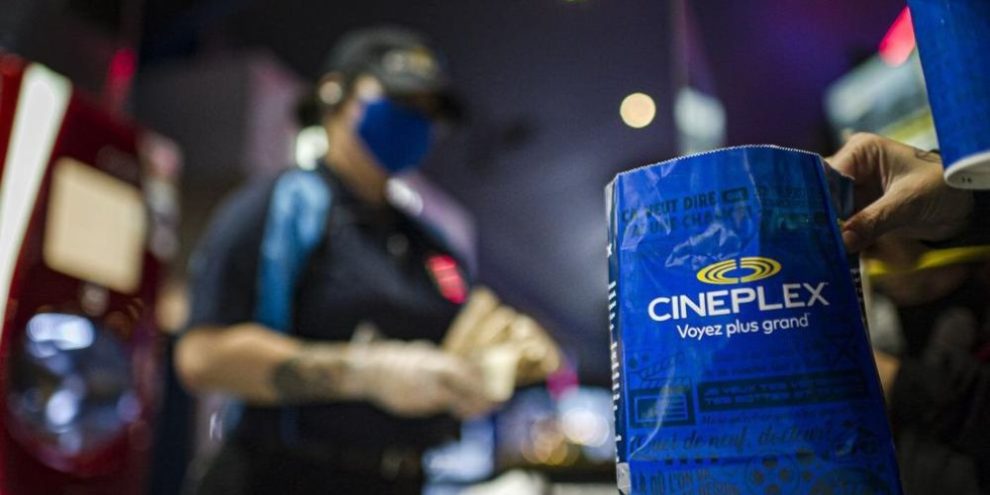 Customers buy popcorn at a Cineplex theatre in downtown Toronto on Wednesday, Aug. 26, 2020. THE CANADIAN PRESS/Christopher Katsarov CKL
