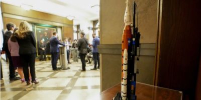 Transport Minister Steven MacKinnon speaks at a press conference in Ottawa beside a Lego model of an Artemis rocket following the introduction of space launch legislation.
