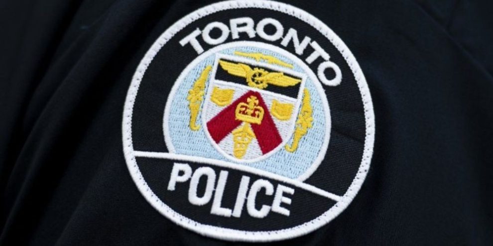 Toronto Police Service logo as officers investigate damage at two Jewish-owned bakery locations.