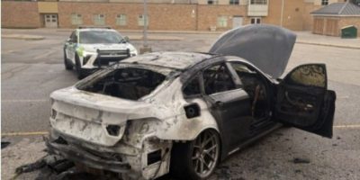 Burned-out black BMW found in a Barrie school parking lot after being reported stolen from Brampton.