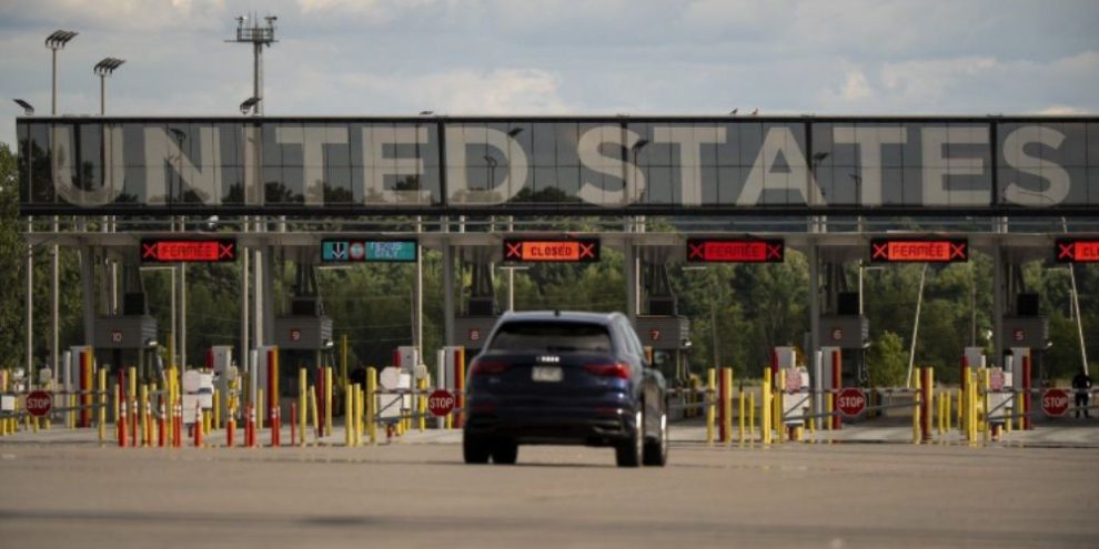 Vehicles approach the United States border as seen at Saint Bernard de Lacolle, Que., on Monday, July 21, 2025.