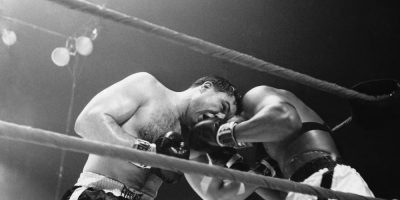 George Chuvalo, left, and Muhammad Ali exchange punches during their 1966 heavyweight fight at Maple Leaf Gardens in Toronto.