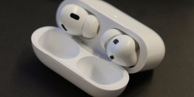 Apple AirPods Pro 2 displayed on a table at an audiology clinic in New York.
