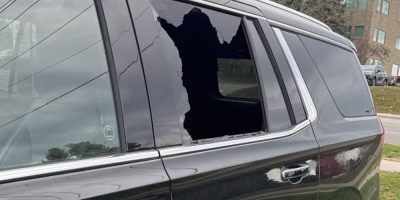 Smashed rear driver's-side window of a vehicle in a Cundles Road East parking lot in Barrie on October 29, 2026.