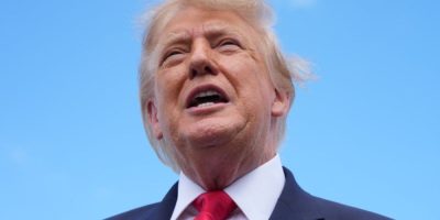 U.S. President Donald Trump speaks to reporters after arriving at an airport in Fort Myers, Florida, on October 23, 2026.